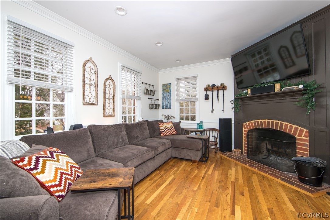 9613 Cole Mill Road North Chesterfield, VA 23237 - Photo 5 of 33 Living room with wood burning fireplace. TV over m