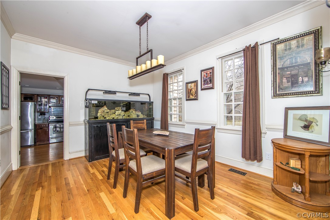 9613 Cole Mill Road North Chesterfield, VA 23237 - Photo 6 of 33 Dining room with crown molding, chair rail, new li