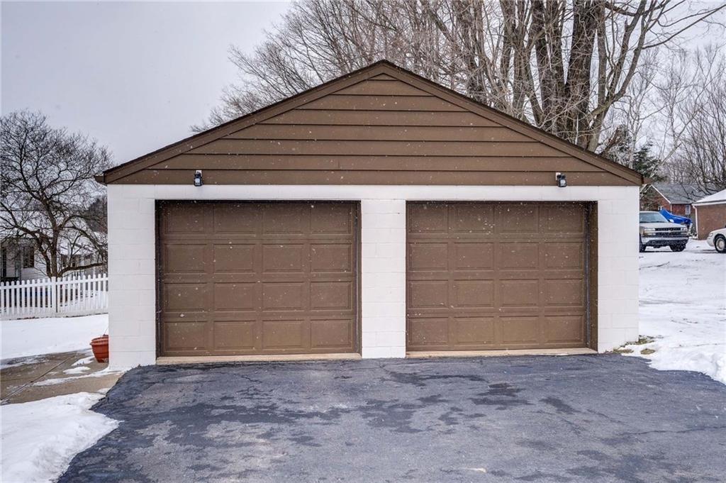 1231 North Main St Extension Butler, PA 16001 - Photo 14 of 15 Large 2 car garage with level driveway. Room for vehicles and extra storage.