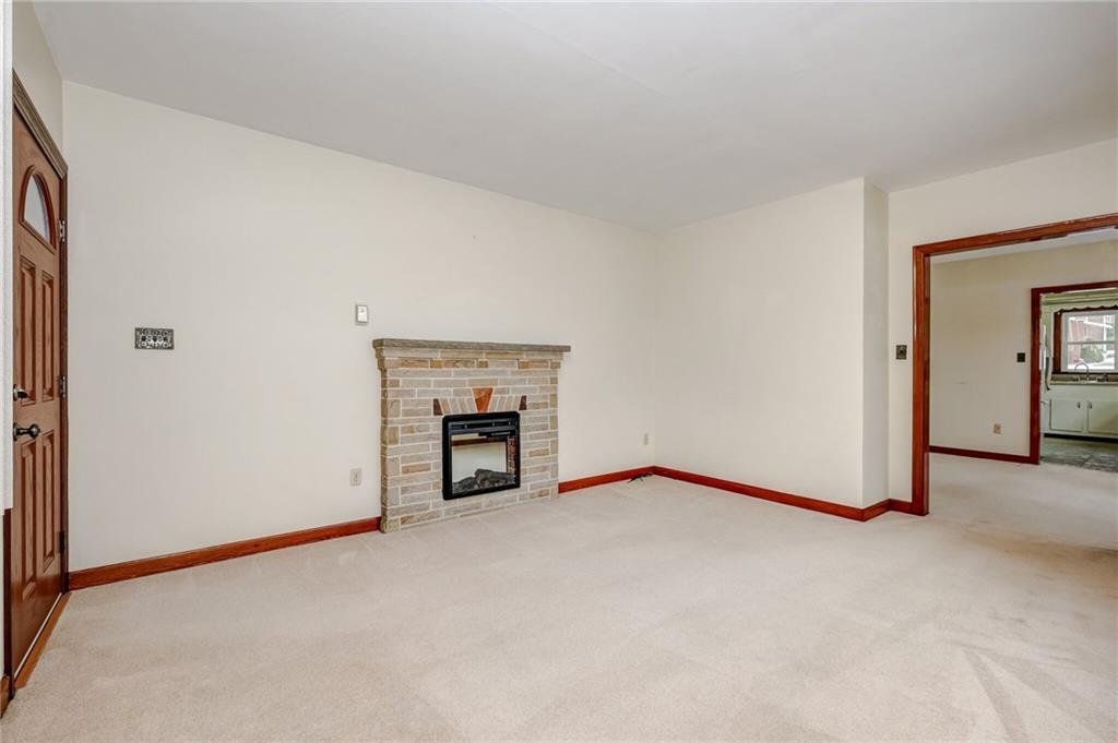 1231 North Main St Extension Butler, PA 16001 - Photo 6 of 15 A view of the living room as you enter the dining room.