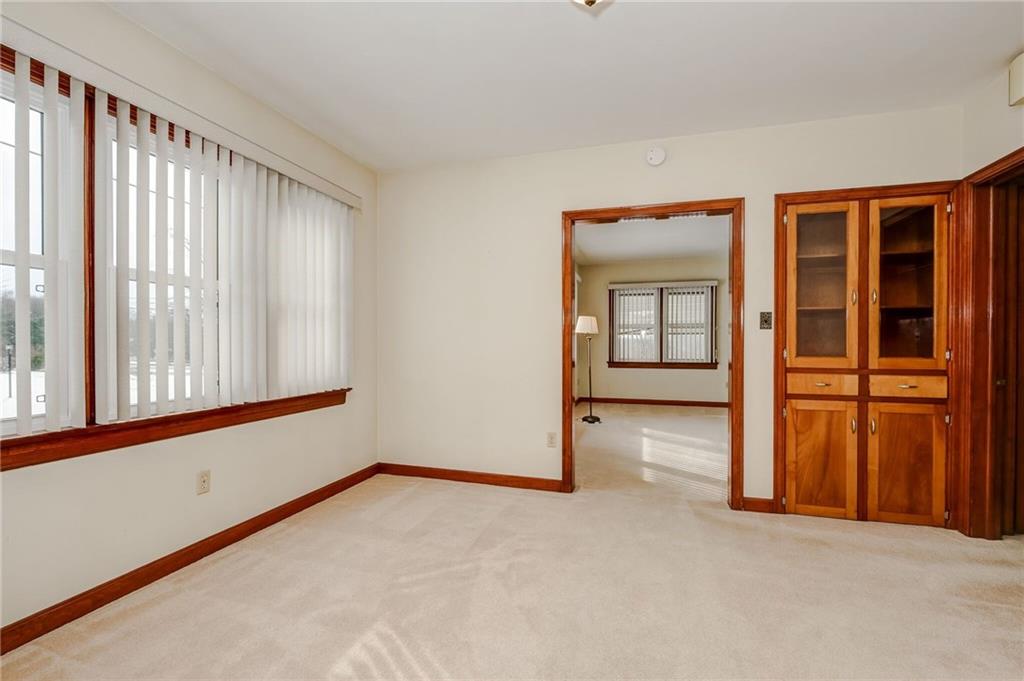 1231 North Main St Extension Butler, PA 16001 - Photo 7 of 15 Lots of light and lovely built in china closet in the dining room.