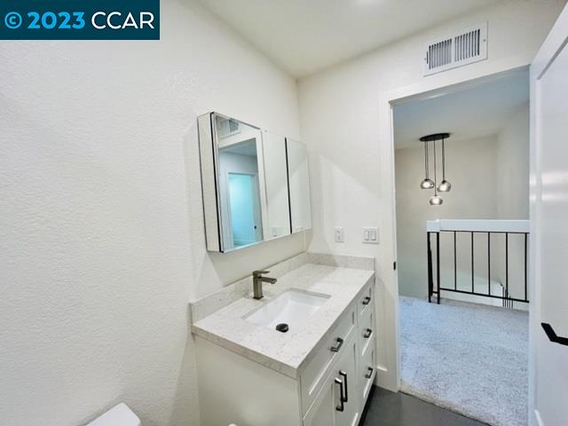 118 Lawnview Circle Danville, CA 94526 - Photo 37 of 50 a bathroom with a sink and a mirror