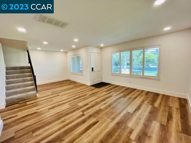 118 Lawnview Circle Danville, CA 94526 - Photo 6 of 50 a view of empty room with wooden floor and fan