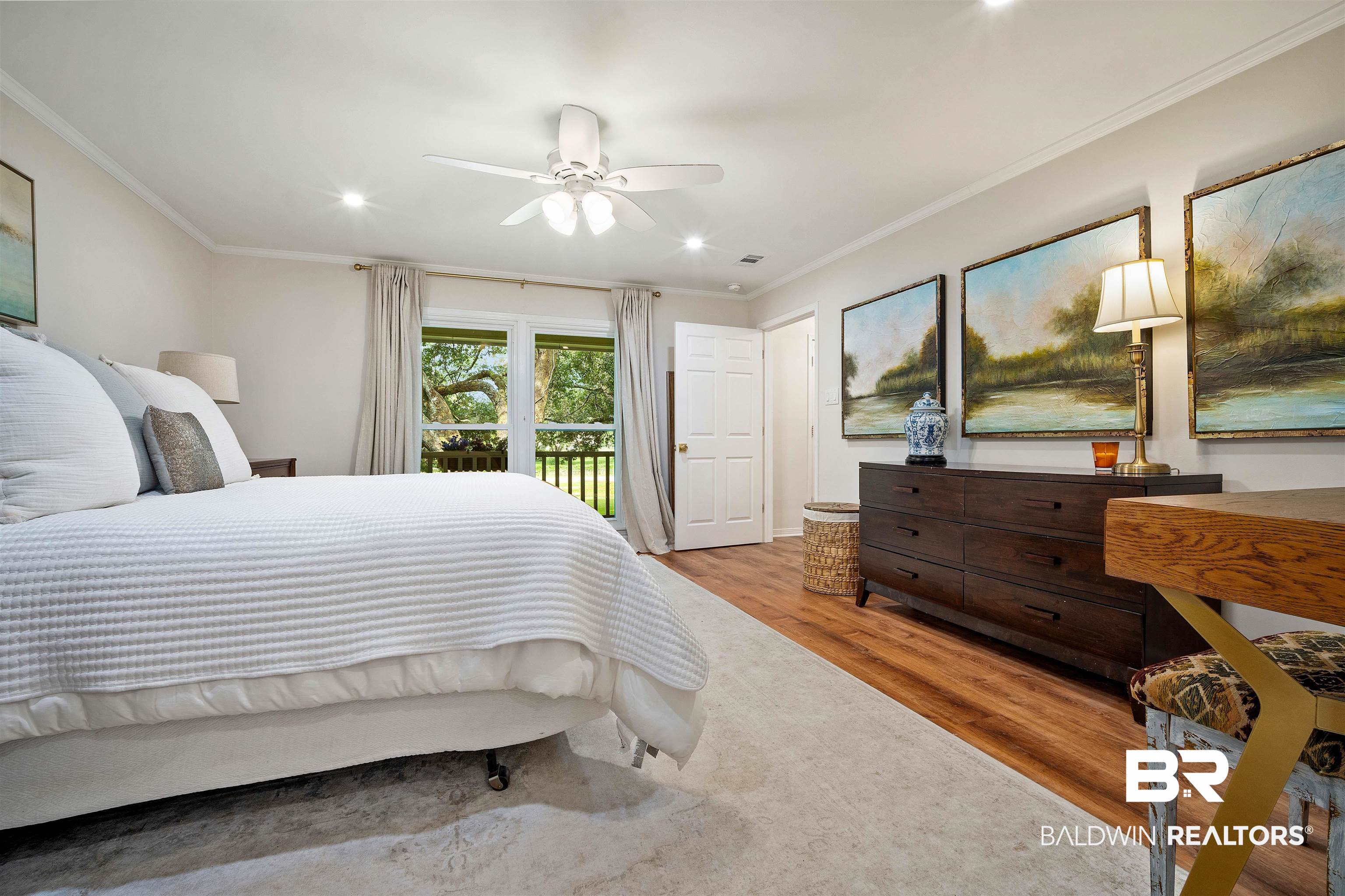 700 Eliza Jordan Road North Mobile, AL 36608 - Photo 23 of 44 Bedroom featuring wood finished floors, access to outside, crown molding, and recessed lighting