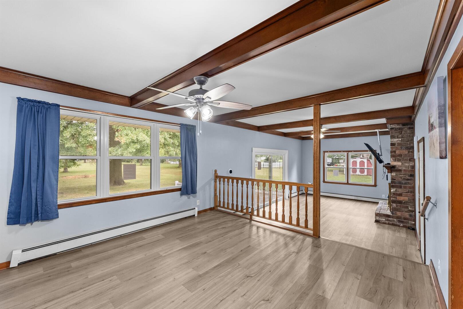 305 North Henderson Road Alexis, IL 61412 - Photo 11 of 31 wooden floor in an empty room with a window