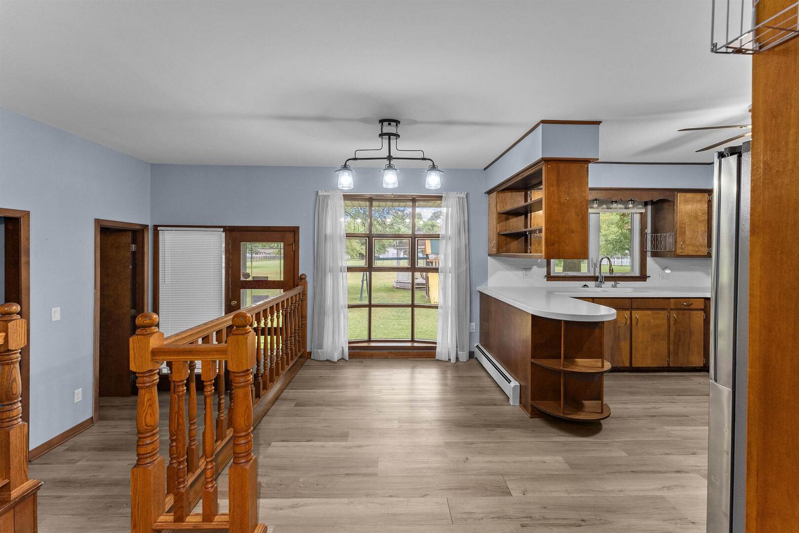305 North Henderson Road Alexis, IL 61412 - Photo 18 of 31 a view of an entryway with wooden floor and windows