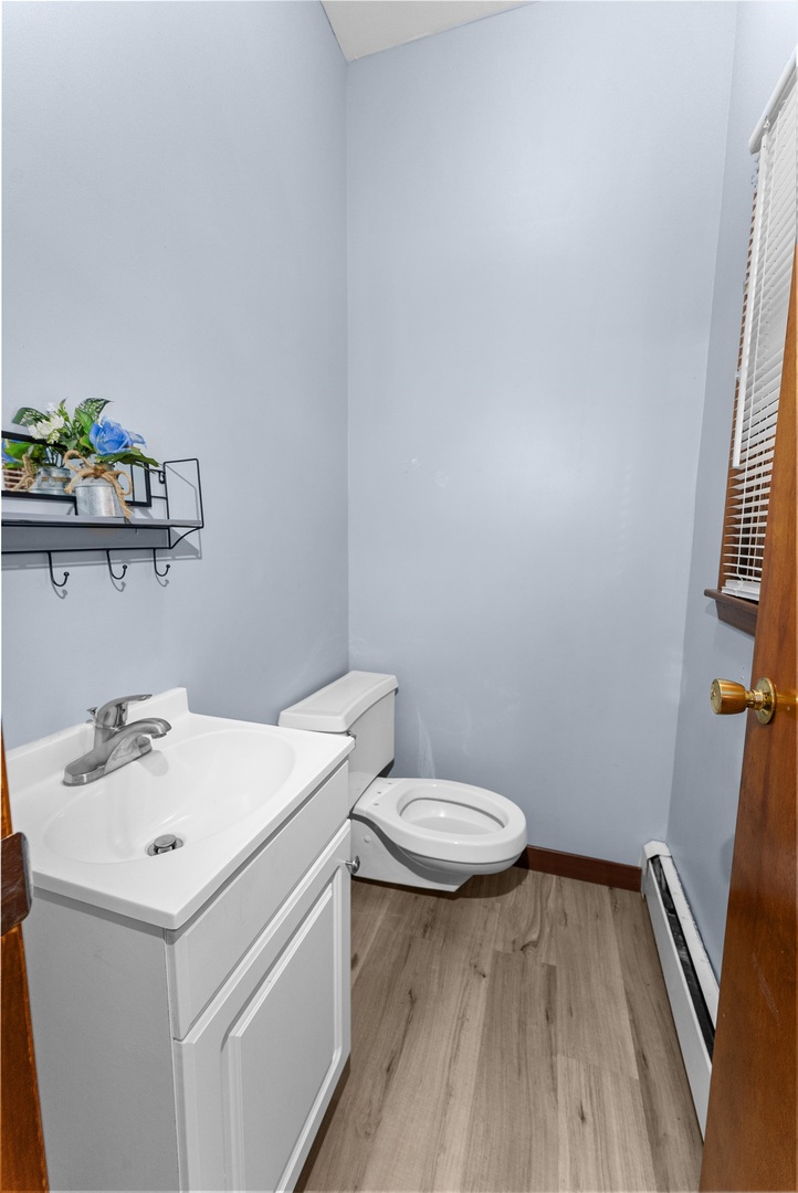 305 North Henderson Road Alexis, IL 61412 - Photo 19 of 31 a bathroom with a sink and a toilet