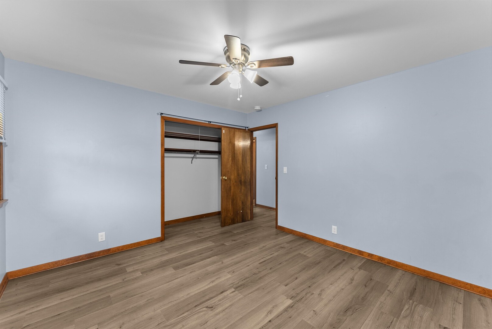 305 North Henderson Road Alexis, IL 61412 - Photo 29 of 31 a view of an empty room with wooden floor
