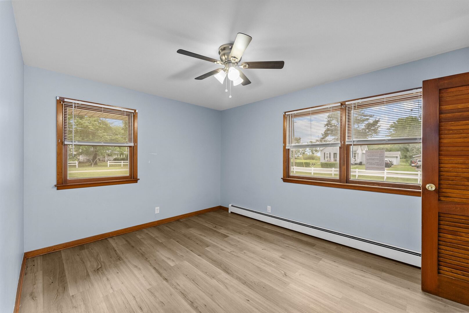 305 North Henderson Road Alexis, IL 61412 - Photo 30 of 31 a view of an empty room with wooden floor and a window