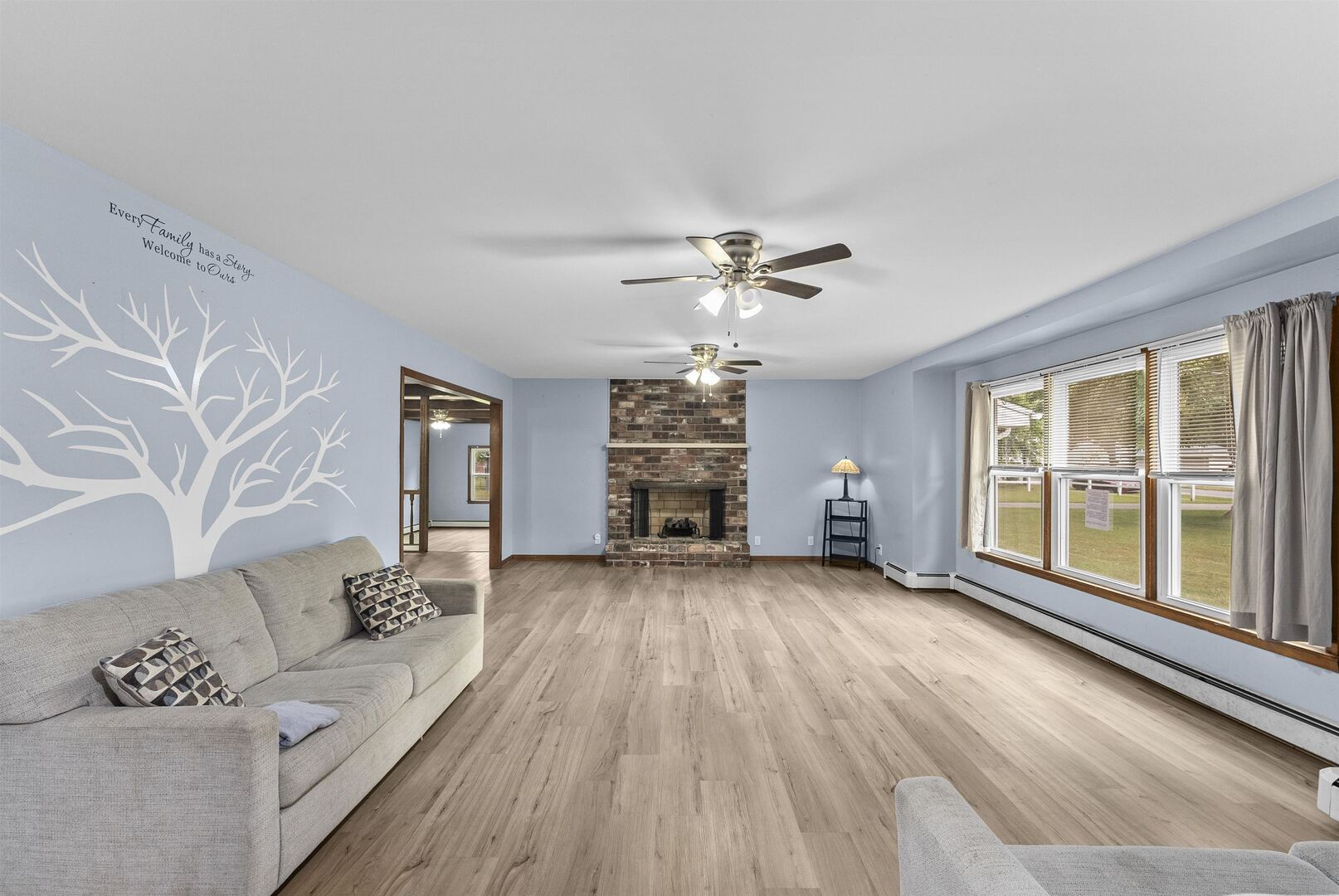 305 North Henderson Road Alexis, IL 61412 - Photo 9 of 31 a living room with furniture and wooden floor