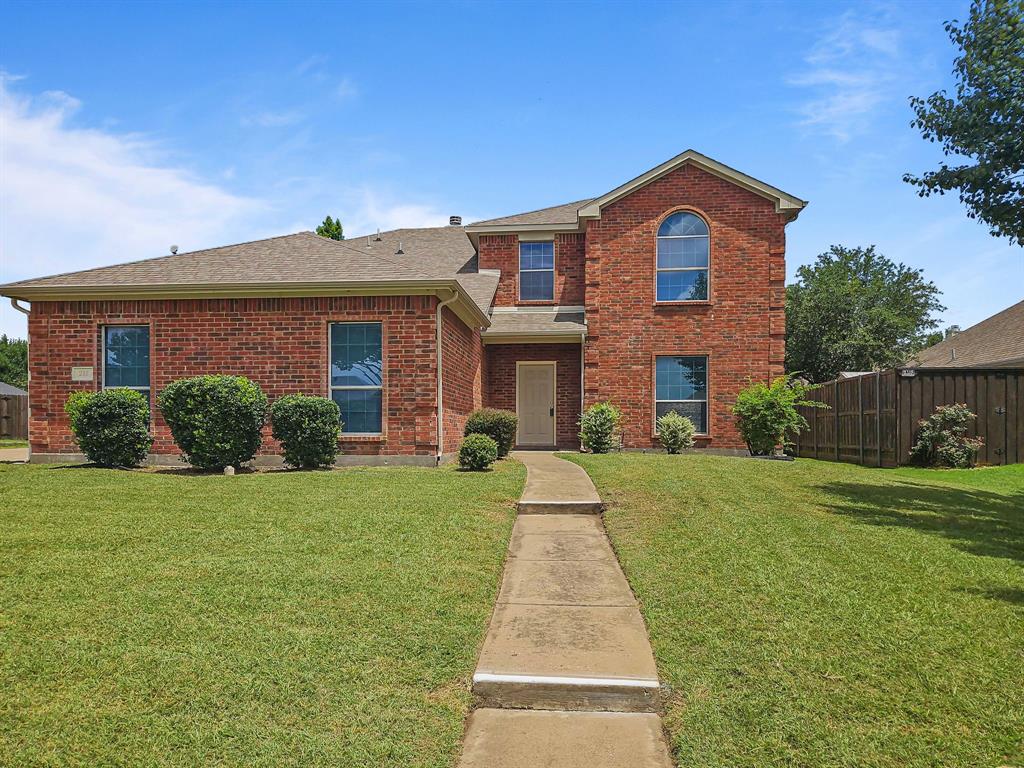 211 Troy Lane Red Oak, TX 75154 - Photo 1 of 1 a front view of a house with a yard