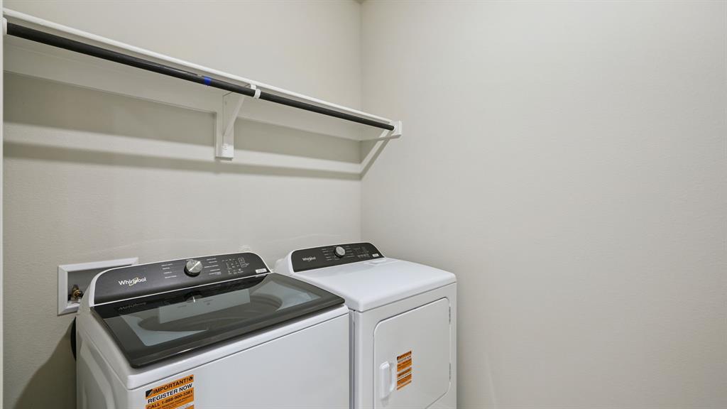 2215 Currents Road Princeton, TX 75407 - Photo 28 of 37 a utility room with dryer and washer