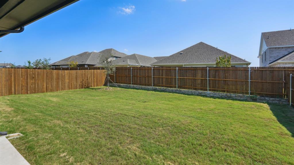 2215 Currents Road Princeton, TX 75407 - Photo 35 of 37 a view of backyard with green space