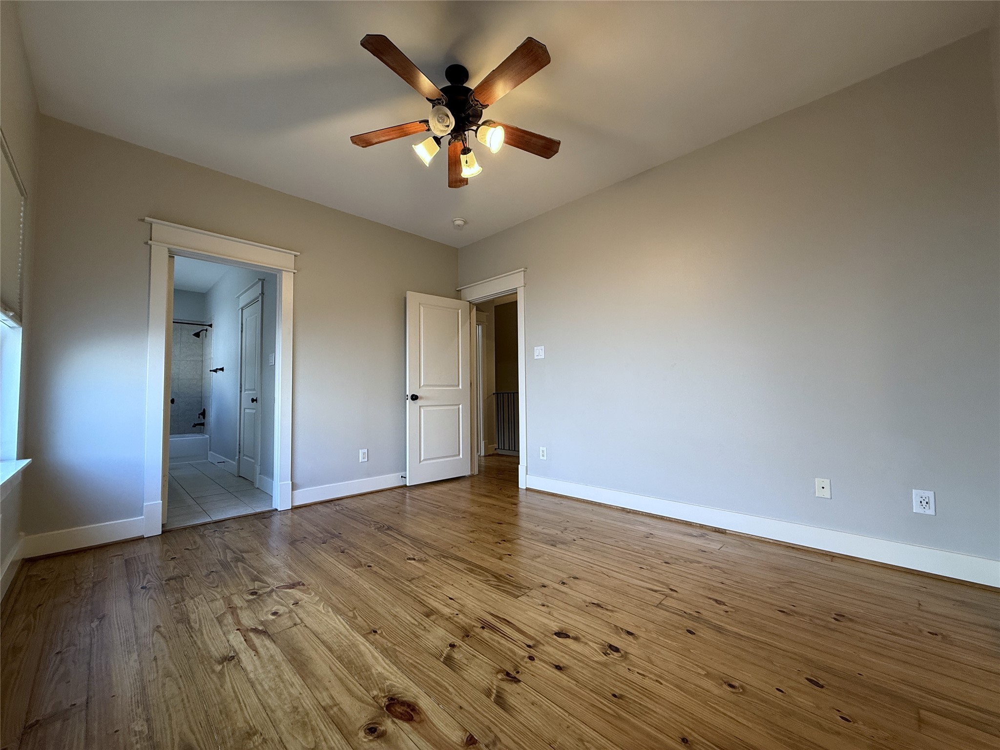 5237 Center Street Houston, TX 77007 - Photo 14 of 27 a view of an empty room and wooden floor
