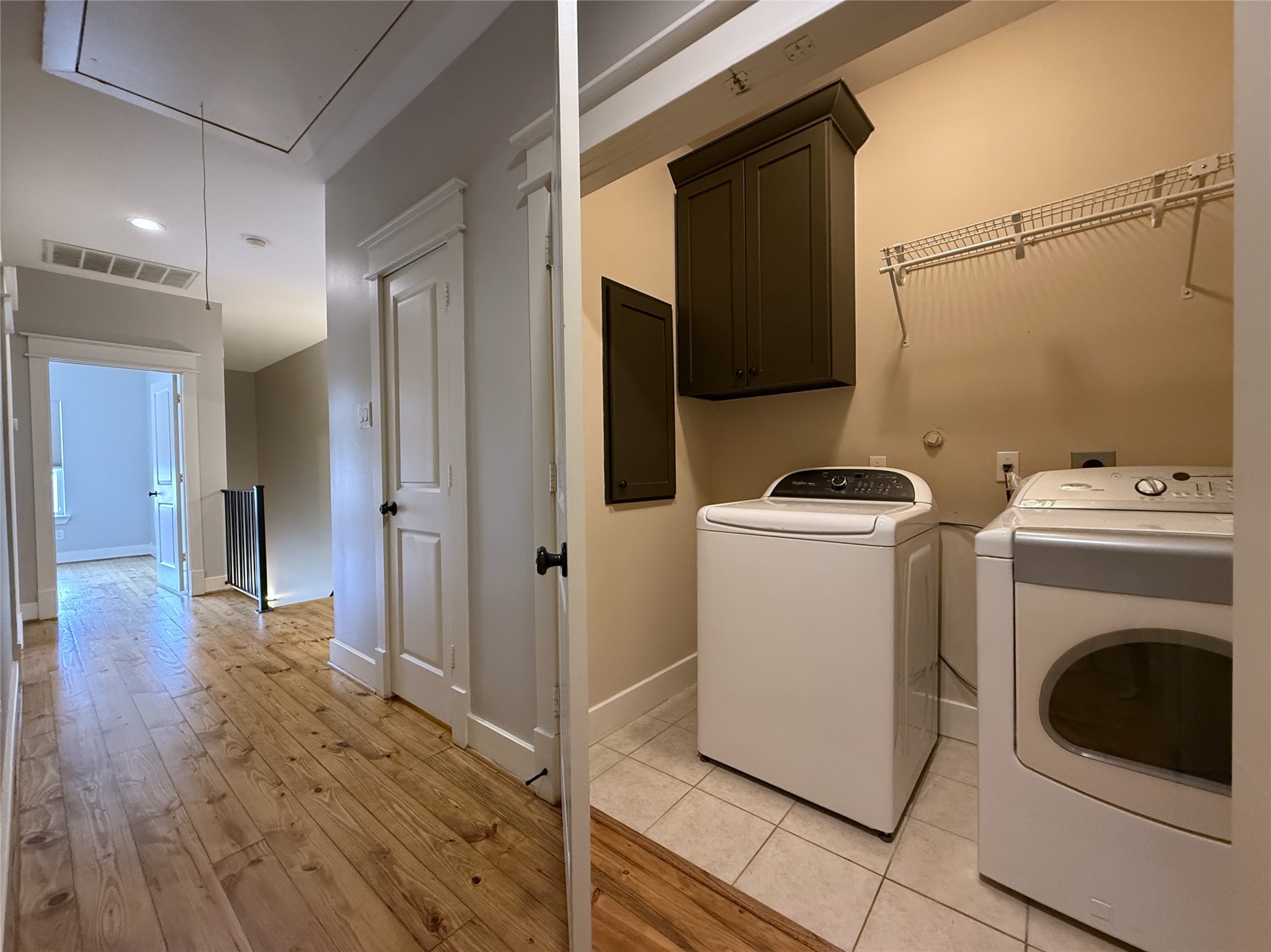 5237 Center Street Houston, TX 77007 - Photo 18 of 27 a view of a storage & utility room with washer and dryer