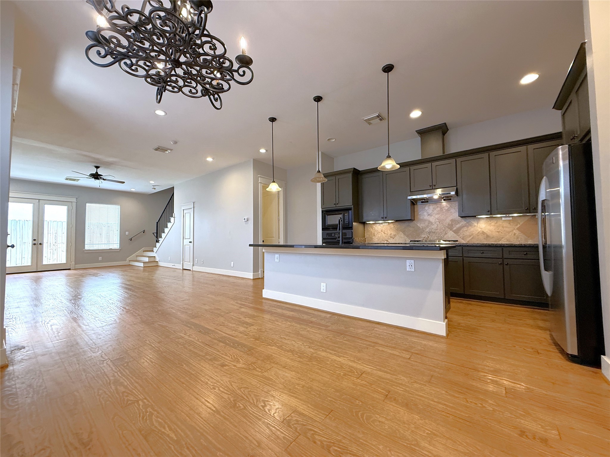 5237 Center Street Houston, TX 77007 - Photo 27 of 27 a large kitchen with a large counter top appliances and cabinets