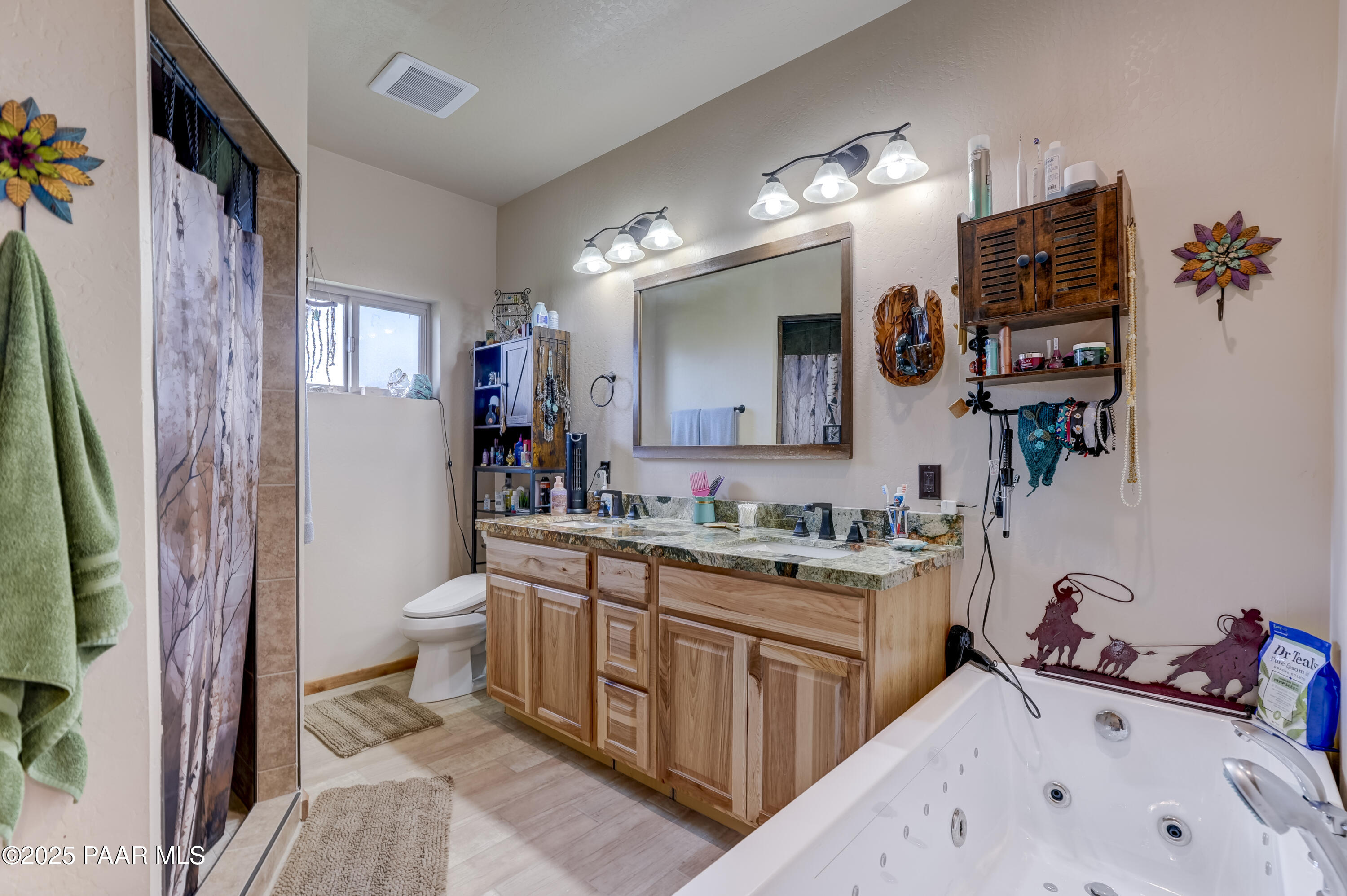 24720 North Rj Way Paulden, AZ 86334 - Photo 12 of 43 a spacious bathroom with a sink a vanity and a mirror