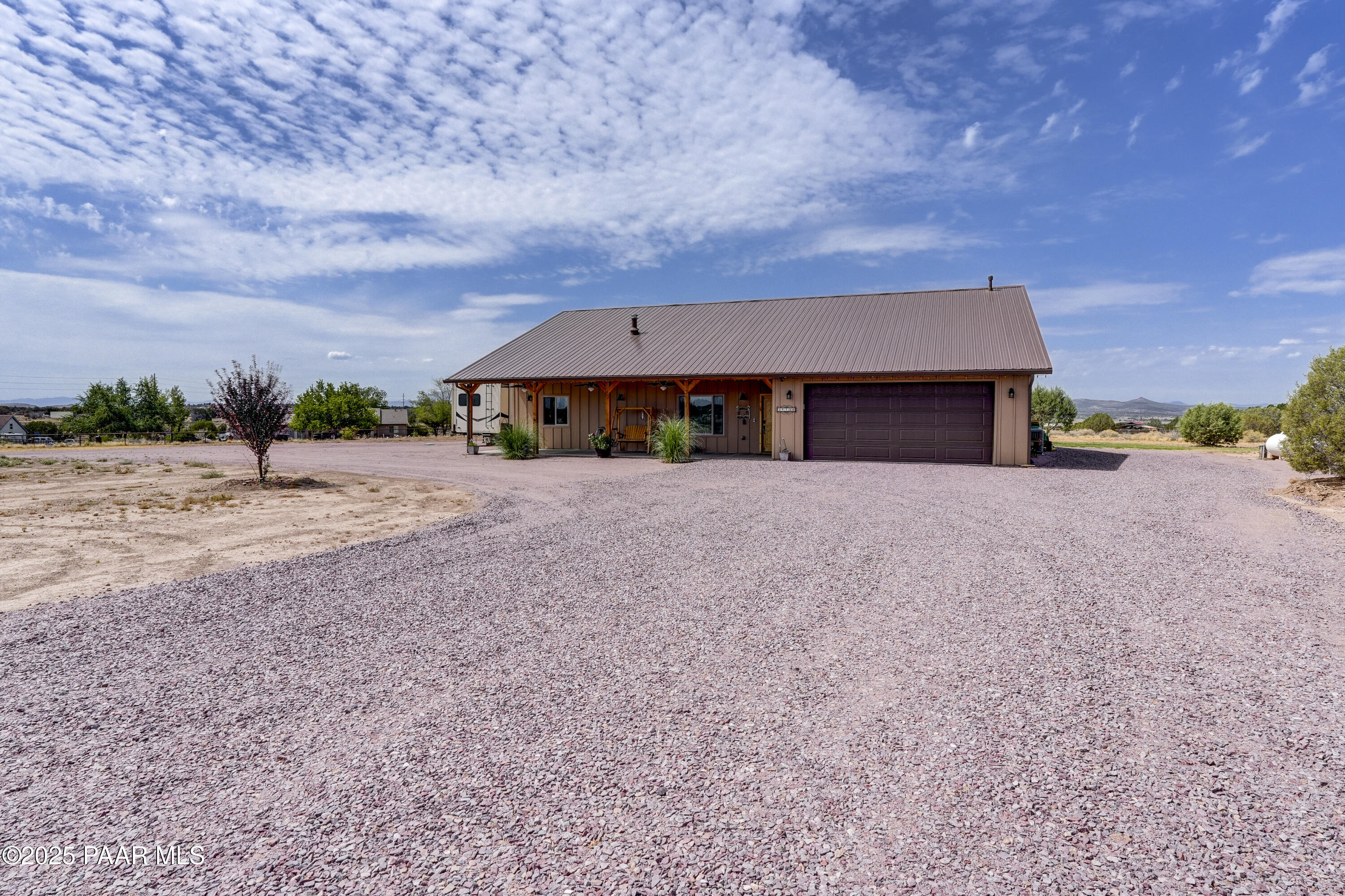 24720 North Rj Way Paulden, AZ 86334 - Photo 2 of 43 front view of a house with a yard