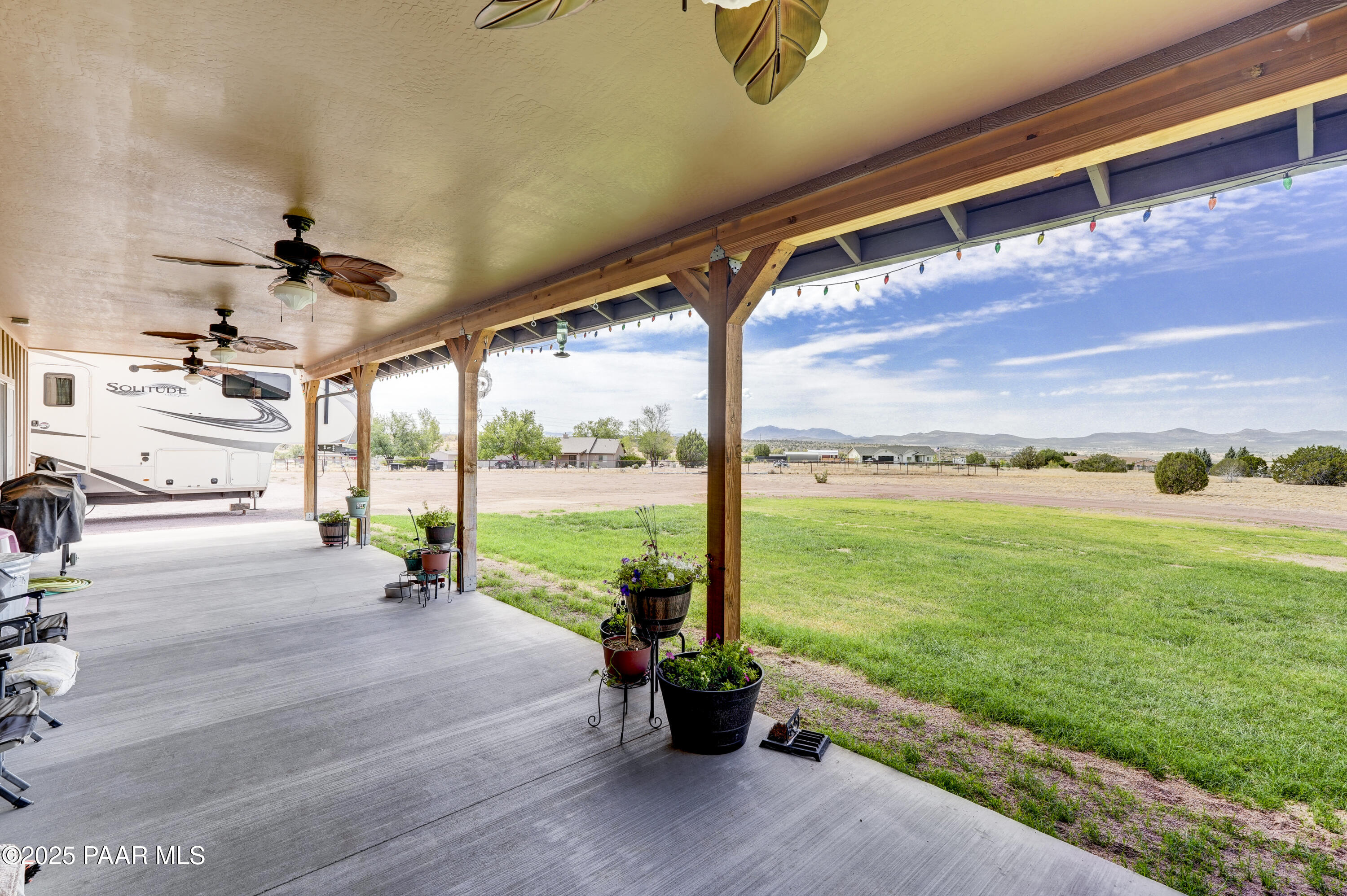 24720 North Rj Way Paulden, AZ 86334 - Photo 23 of 43 a view of a porch with furniture and garden
