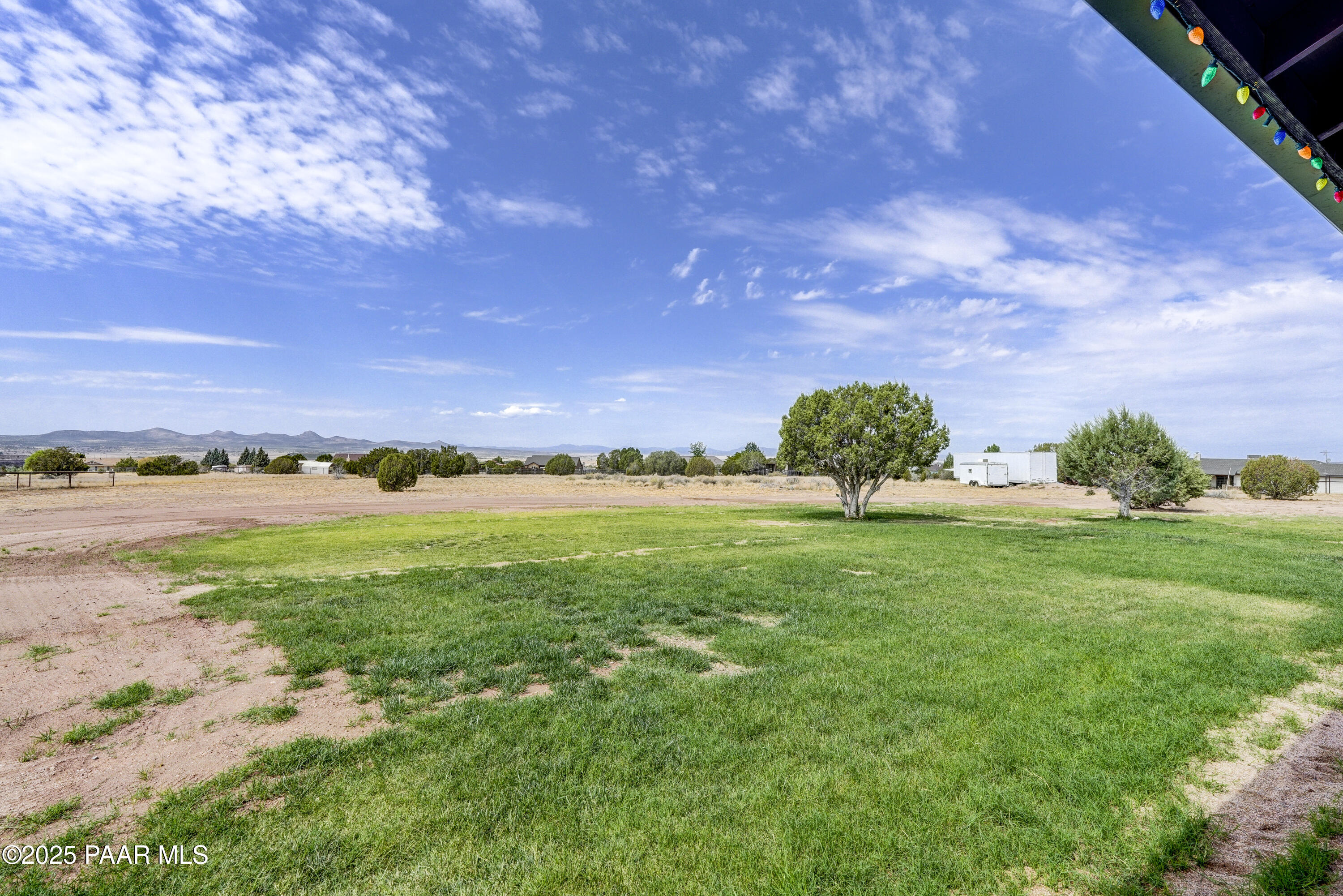 24720 North Rj Way Paulden, AZ 86334 - Photo 25 of 43 a view of a garden with an ocean and trees