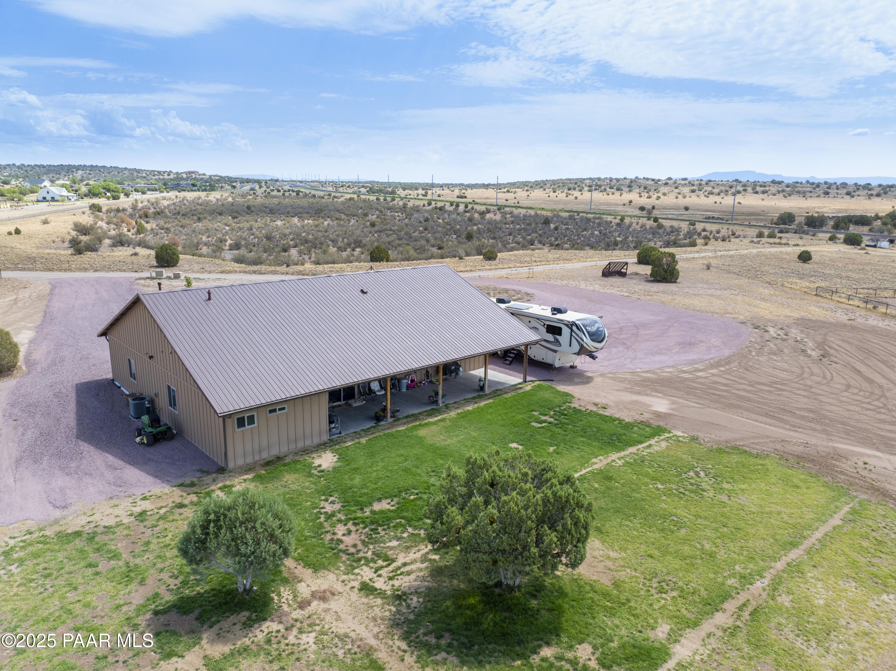 24720 North Rj Way Paulden, AZ 86334 - Photo 31 of 43 an aerial view of a house with a garden and mountain view