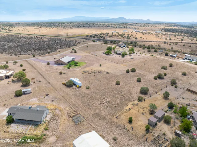 an aerial view of beach with ocean view