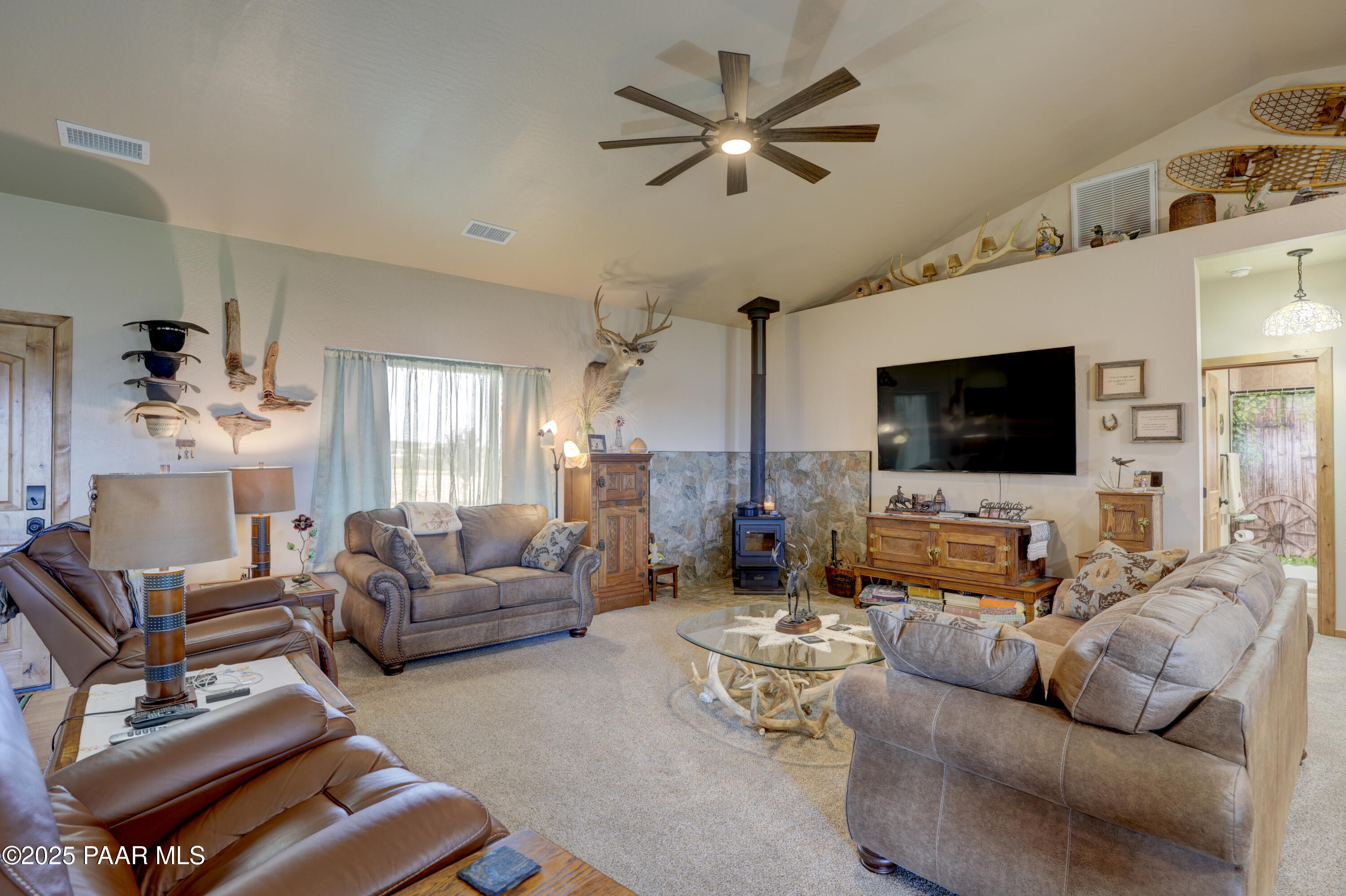 24720 North Rj Way Paulden, AZ 86334 - Photo 7 of 43 a living room with furniture and a flat screen tv