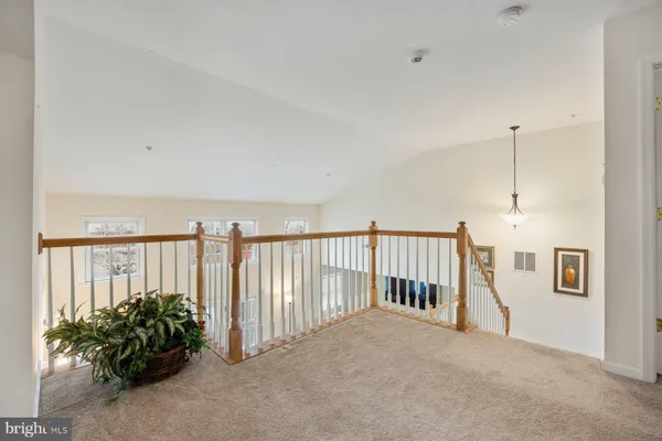 a view of a hallway with entryway