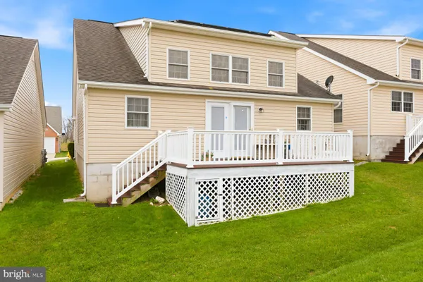 a view of a wooden roof with city view
