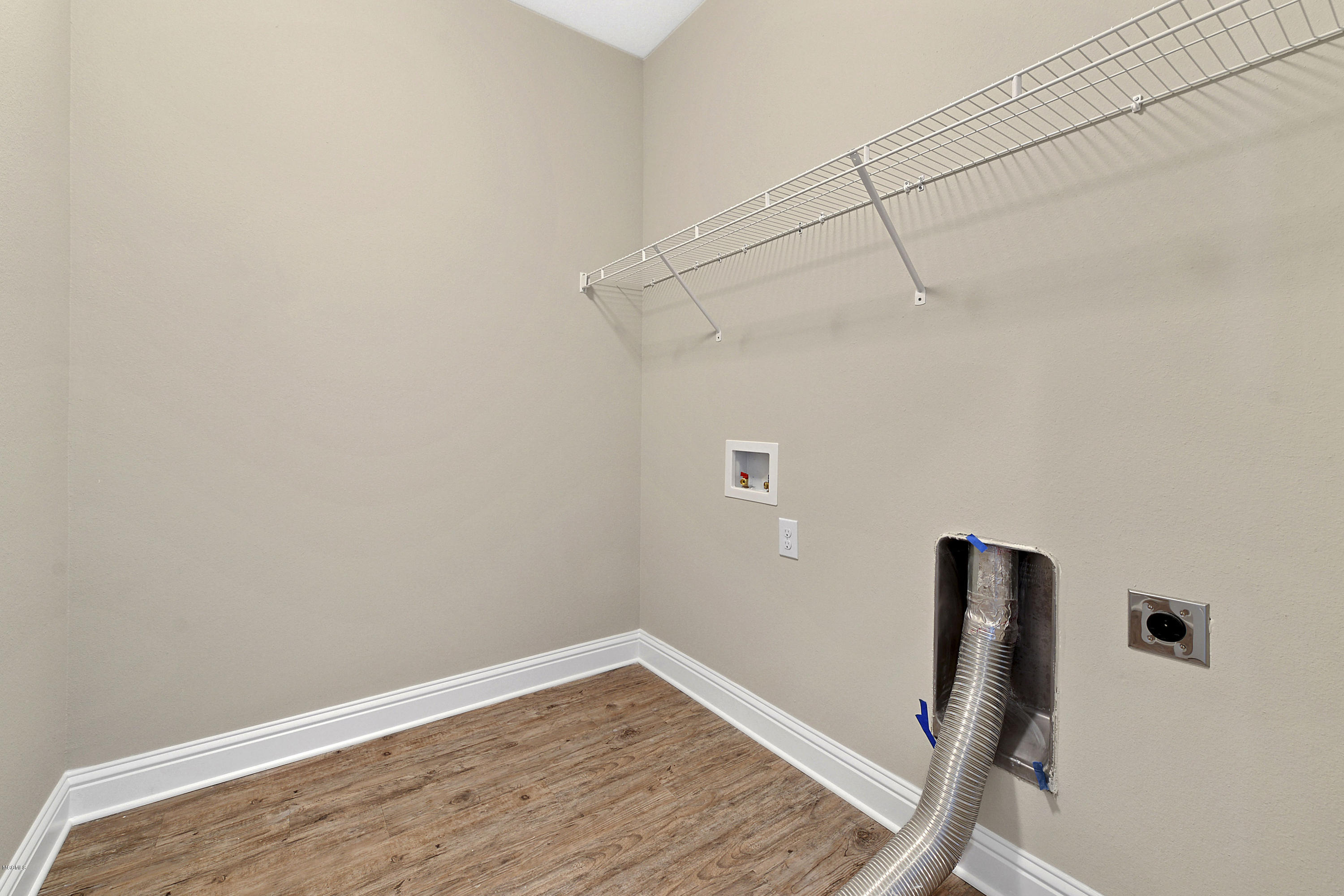 6681 Sugarcane Circle Ocean Springs, MS 39564 - Photo 28 of 29 Laundry Room