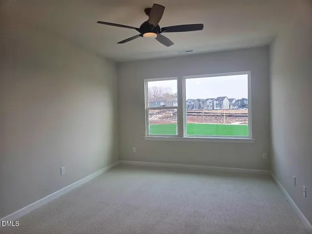 an empty room with window