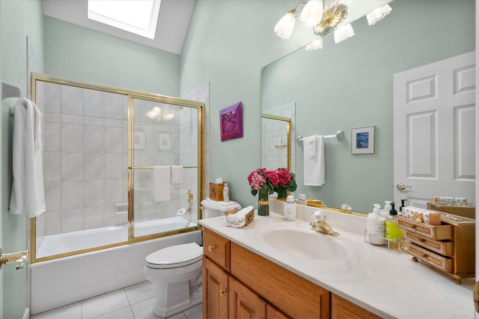 35 Walnut Circle Sugar Grove, IL 60554 - Photo 18 of 42 a bathroom with a sink vanity mirror and toilet