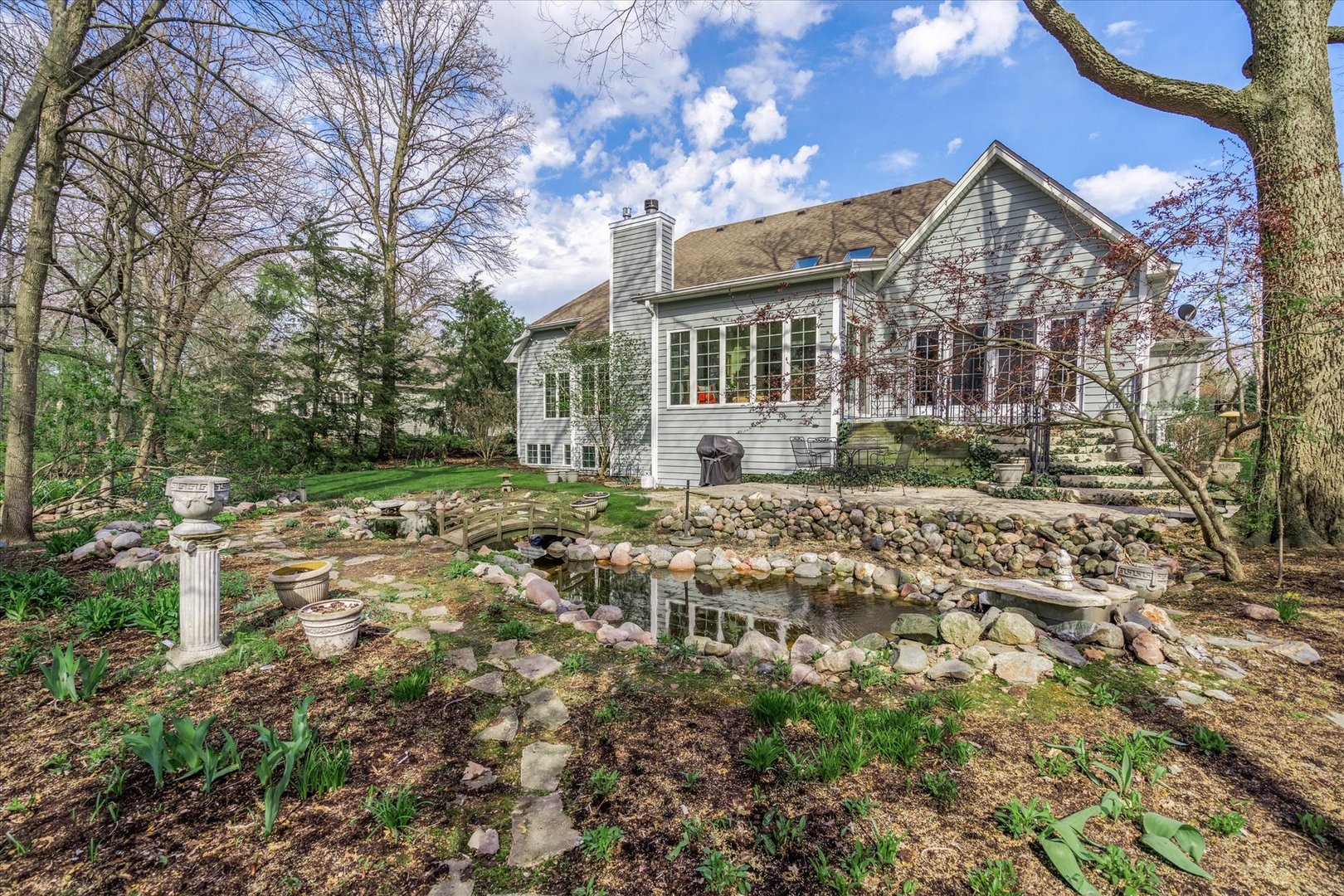35 Walnut Circle Sugar Grove, IL 60554 - Photo 26 of 42 a front view of a house with a yard