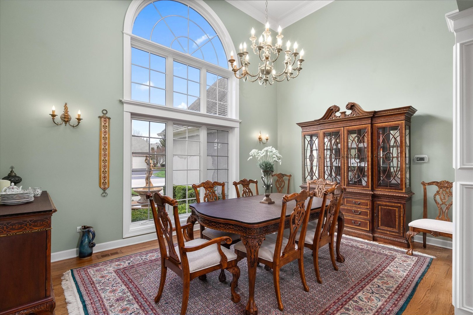 35 Walnut Circle Sugar Grove, IL 60554 - Photo 6 of 42 a view of a dining room with furniture a chandelier and wooden floor