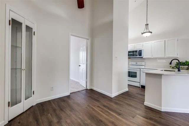 a view of kitchen with wooden floor