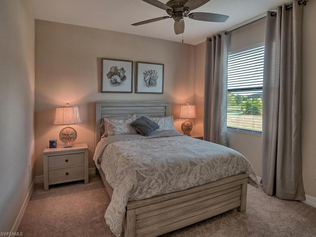 2850 Aviamar Circle Naples, FL 34114 - Photo 19 of 26 a bedroom with bed and window