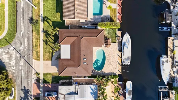 an aerial view of a highlighted house