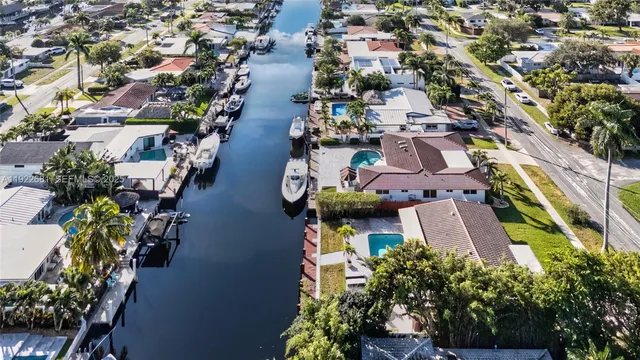 an aerial view of a house with outdoor space
