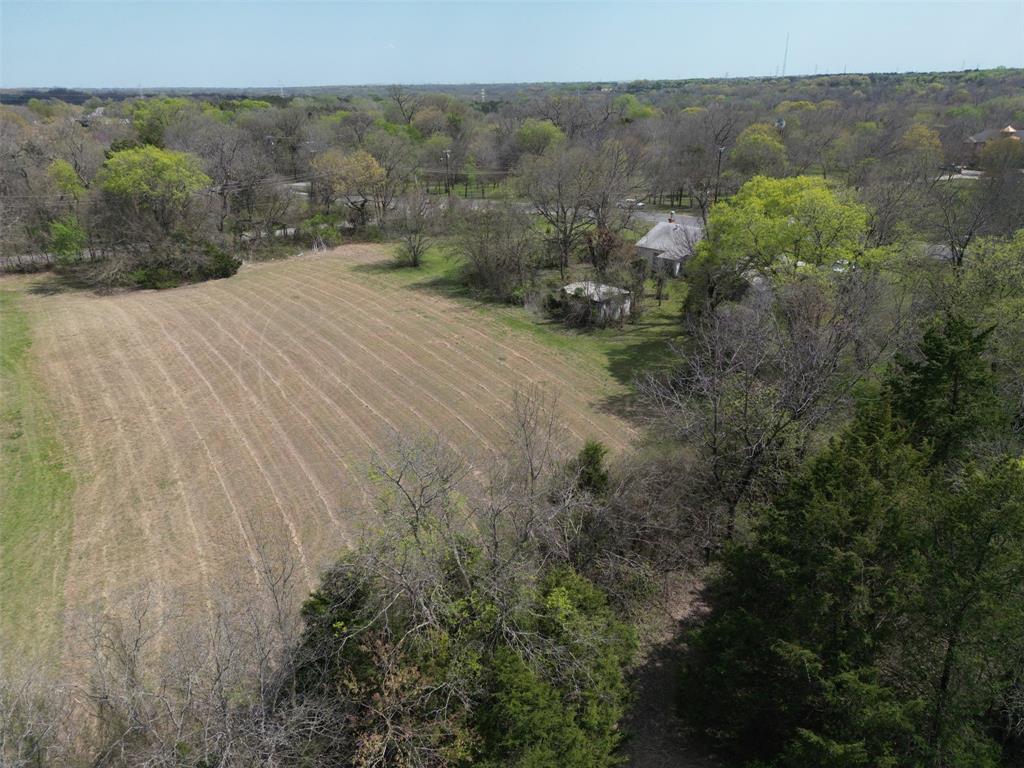 1509 West Main Street Lancaster, TX 75146 - Photo 16 of 19 a view of a dry yard with green space
