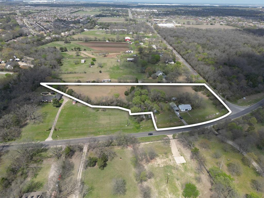 1509 West Main Street Lancaster, TX 75146 - Photo 2 of 19 a view of outdoor space and swimming pool