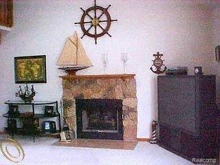 2310 Swarthout Road Pinckney, MI 48169 - Photo 11 of 11 stone fireplace