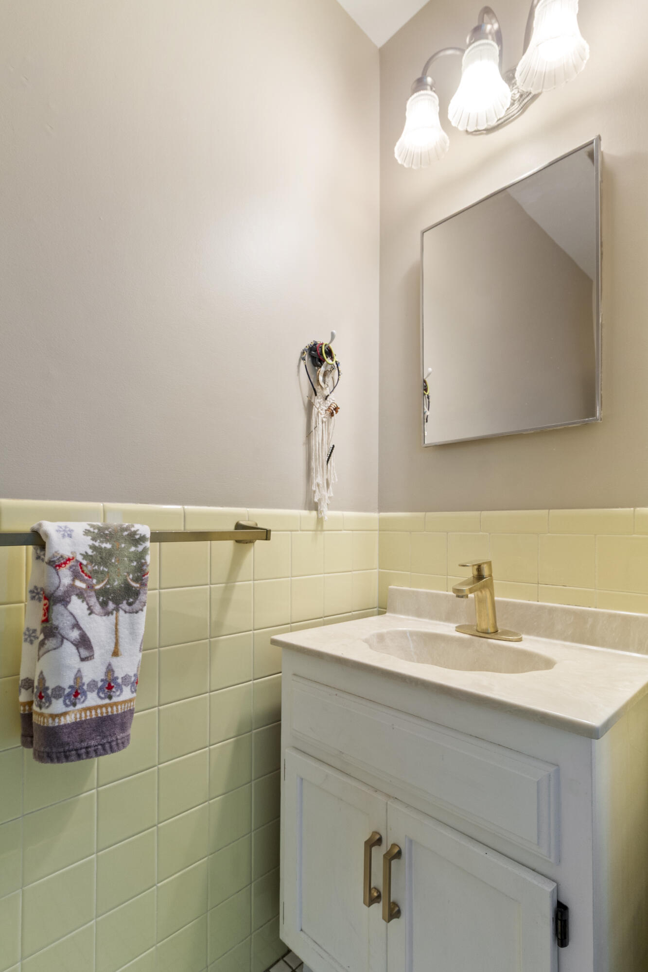 407 East Elizabeth Drive Crown Point, IN 46307 - Photo 12 of 24 a bathroom with a sink and a mirror
