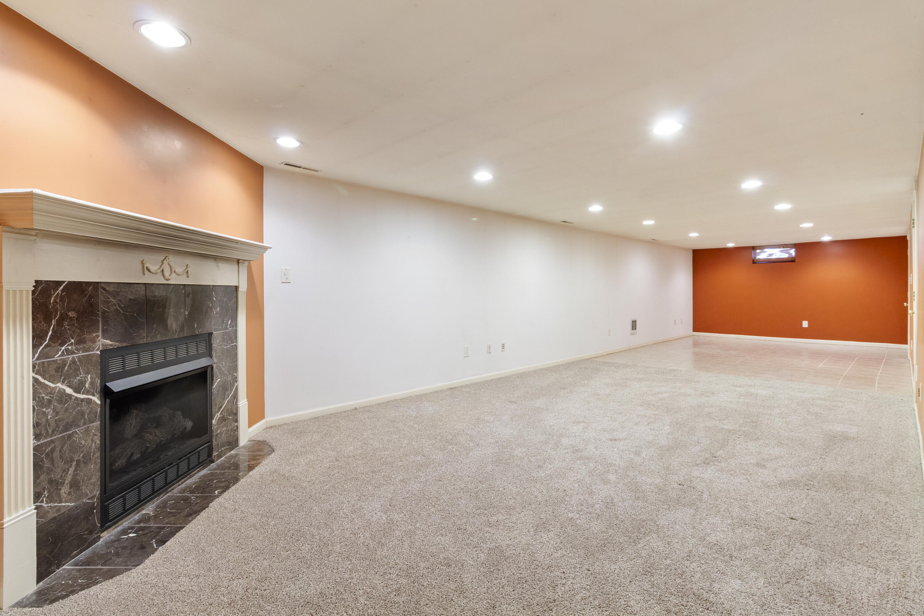 407 East Elizabeth Drive Crown Point, IN 46307 - Photo 17 of 24 a view of an empty room with a fireplace