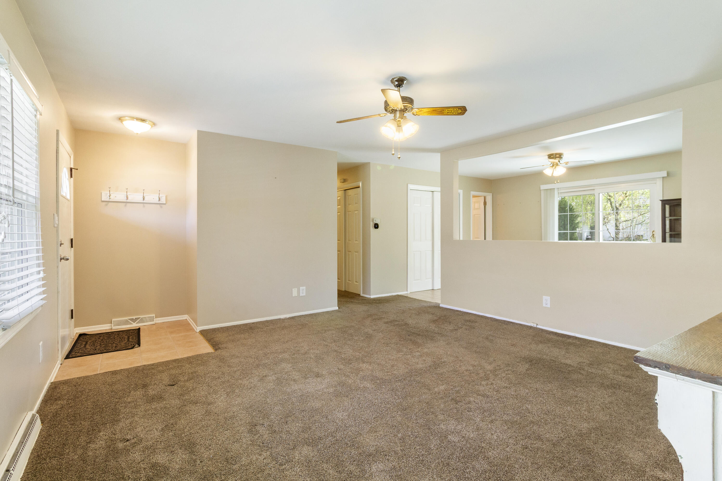 407 East Elizabeth Drive Crown Point, IN 46307 - Photo 3 of 24 a view of an empty room with a window