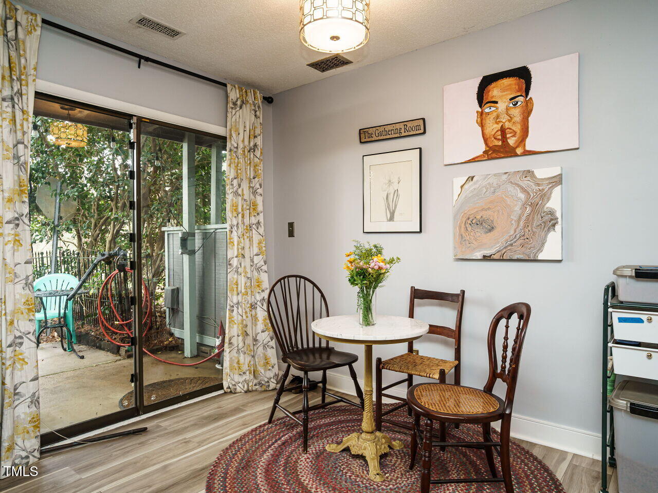 713 Godwin Court Raleigh, NC 27606 - Photo 8 of 29 a view of a dining room with furniture window and outside view