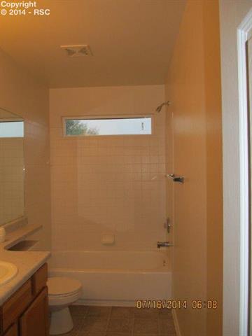 8059 Oliver Road Peyton, CO 80831 - Photo 2 of 9 Full bath in hall is shared by secondary bedrooms