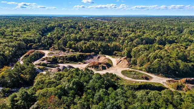 an aerial view of residential house with outdoor space
