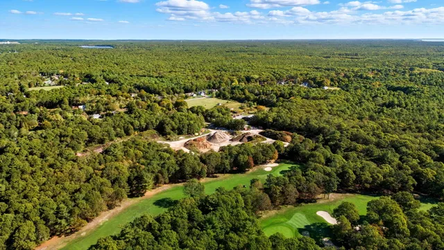 a view of a yard and an ocean