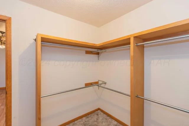a view of a storage & utility room with washer and dryer