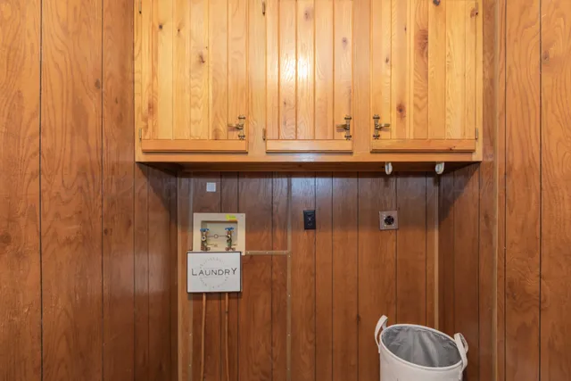 a view of a house with a tree